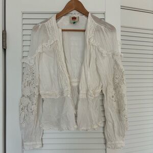 Farm women's medium blouse worn once. Needs belt or button